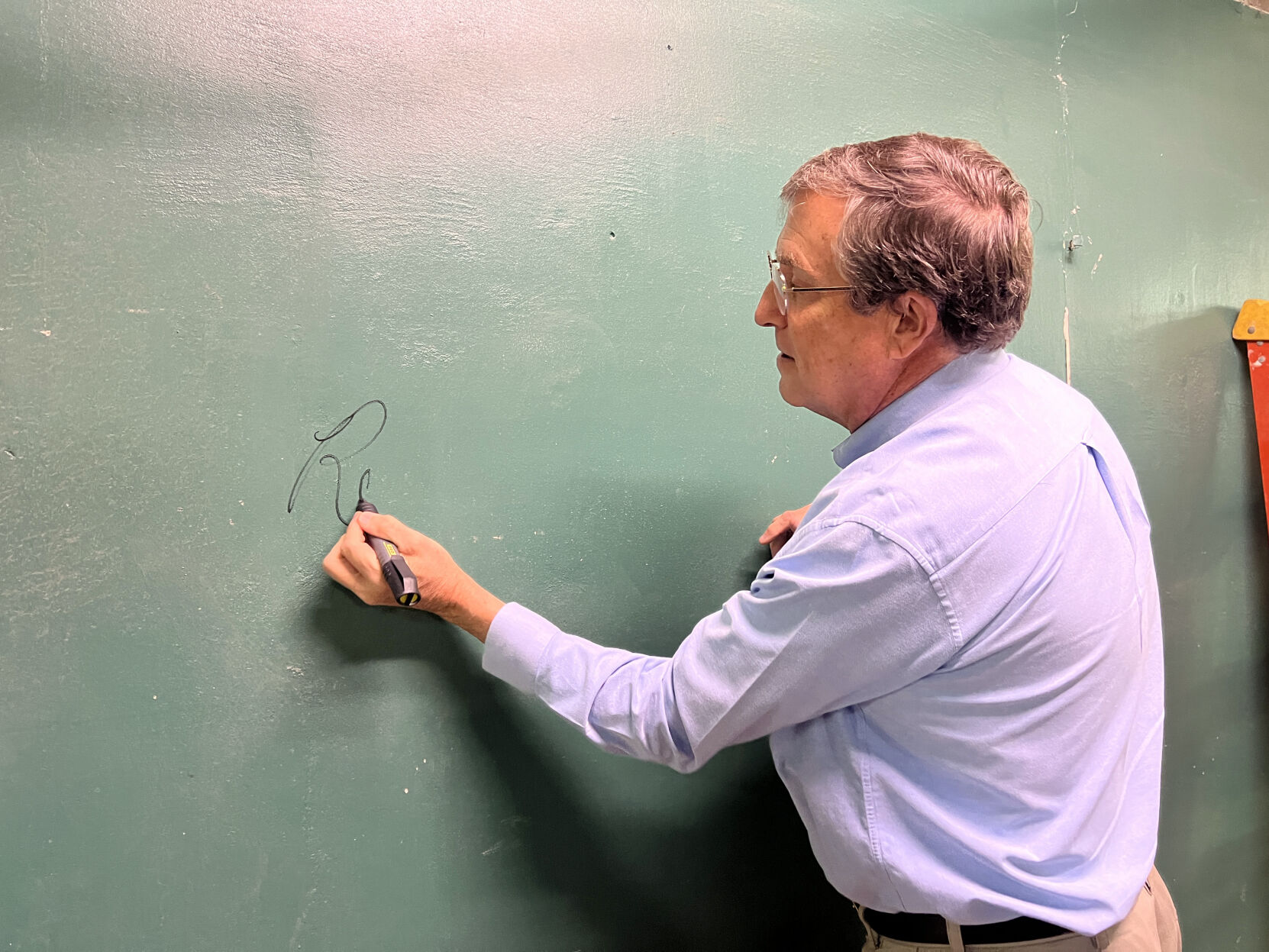 Robert C. Ervin wall signing